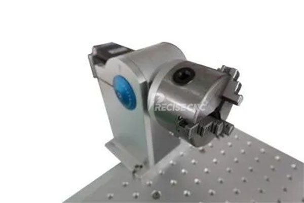 Rotary clamp for glass tube laser drilling holes